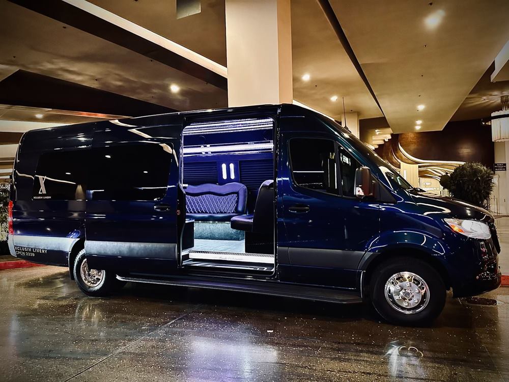Black Mercedes Sprinter with open passenger cabin for group transportation
