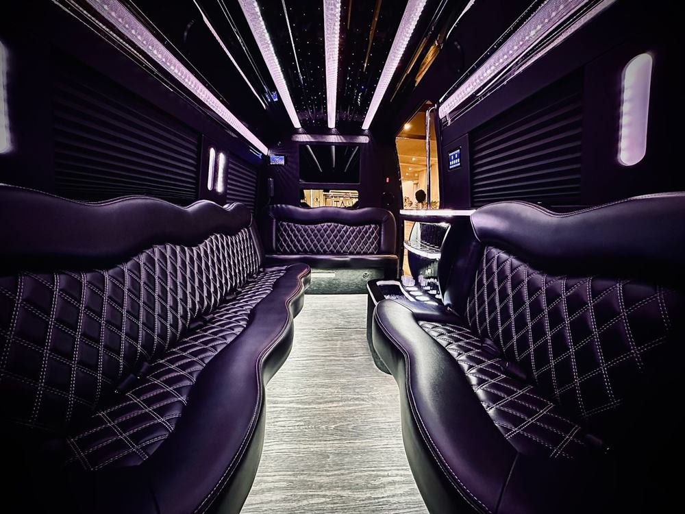 Mercedes Sprinter cabin with black quilted group seating